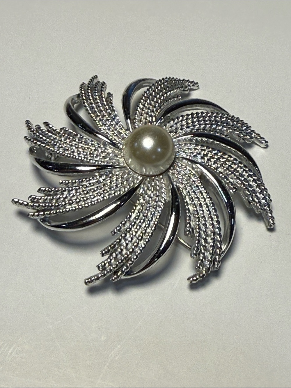 Sarah Coventry Vintage Silver Tone Sunburst Swirl Brooch Faux Pearl Center Pin